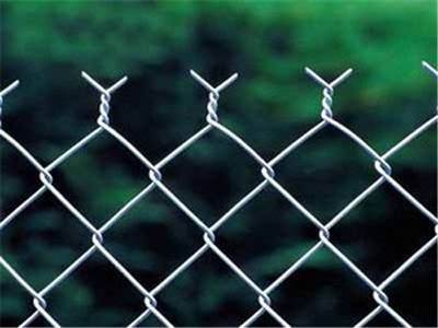 Galvanized chain link fence with twist edge