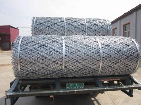  Two rolls of welded razor wire mesh on the truck.